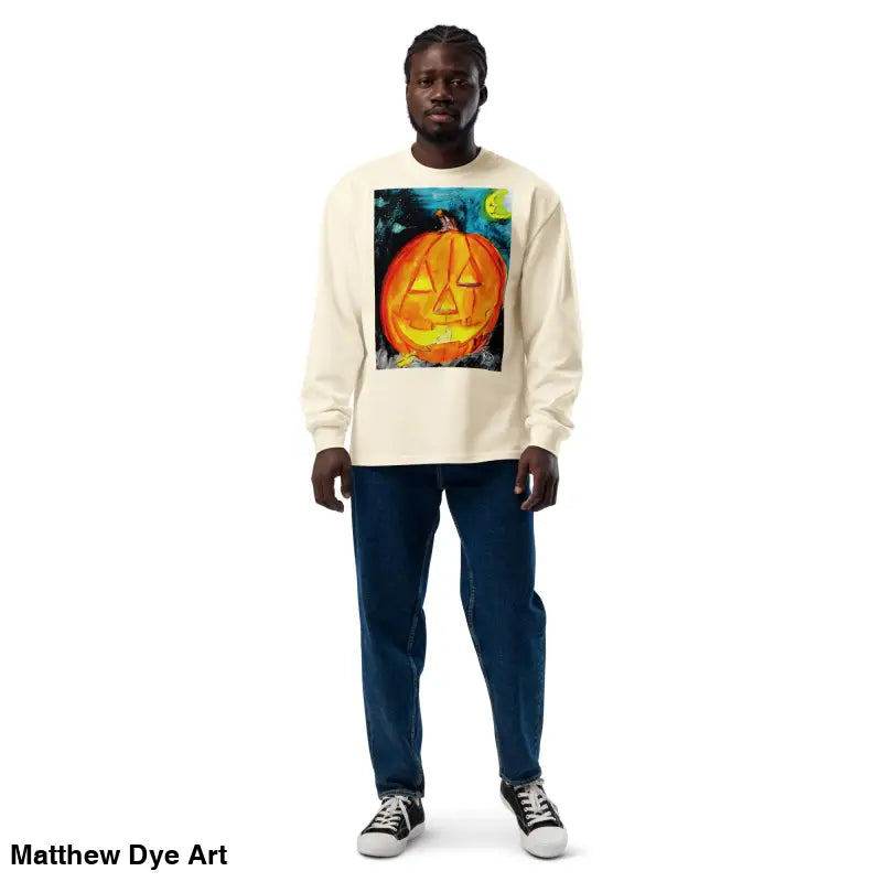 Man wearing a Pumpkin Mischief sweatshirt featuring Matthew Dye Art’s whimsical Jack-o’-Lantern design