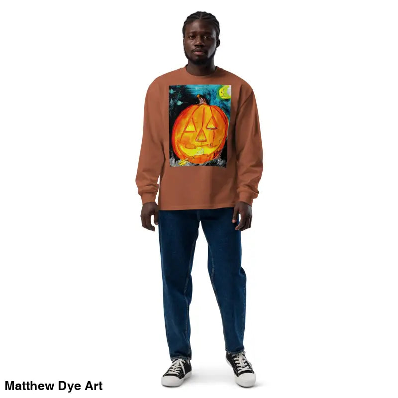 Man in pumpkin-themed shirt featuring Matthew Dye Art’s whimsical jack-o’-lantern design