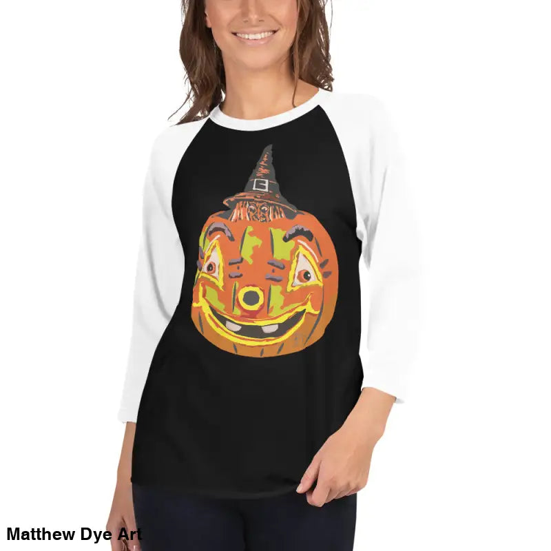 Stylish raglan shirt featuring pumpkin graphic for charming retro Halloween flair