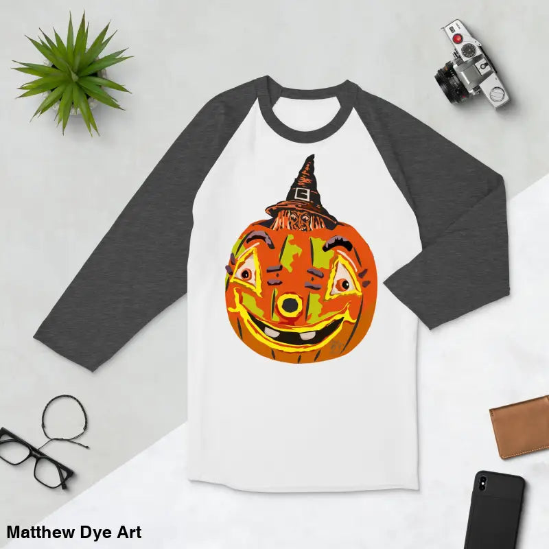 Stylish raglan shirt featuring charming retro Halloween design with a pumpkin witch theme