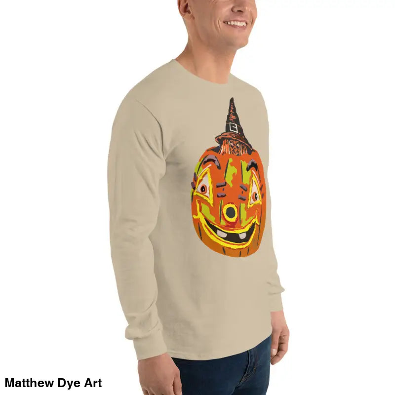Beige long-sleeved Pumpkin Witch Men’s shirt featuring whimsical pumpkin graphic