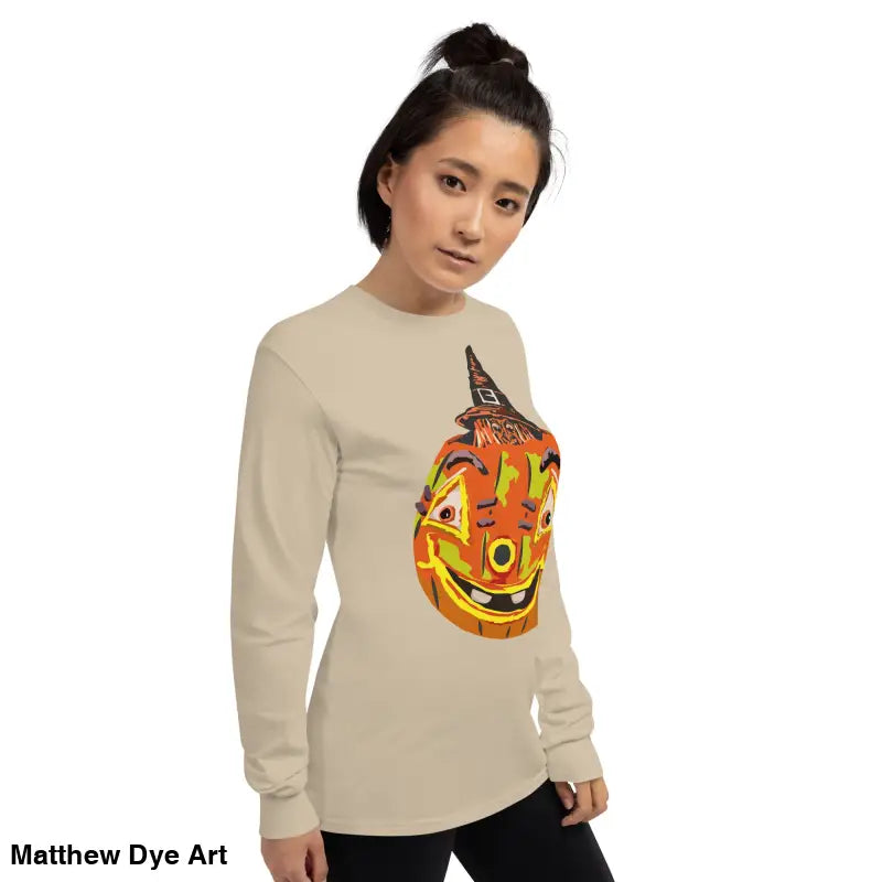 Beige long-sleeved shirt featuring whimsical pumpkin graphic for Pumpkin Witch Men’s style