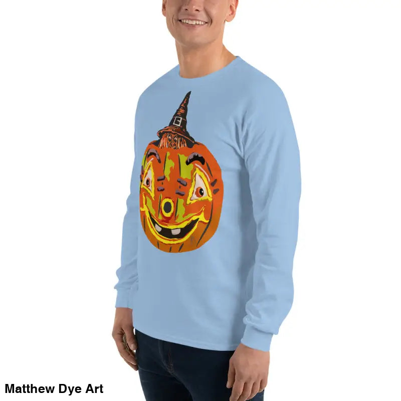 Light blue long-sleeved shirt featuring a whimsical pumpkin graphic for Halloween