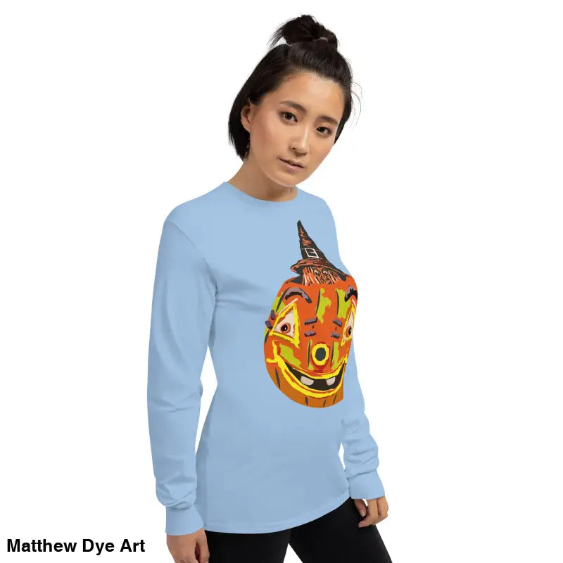 Light blue long-sleeved shirt featuring a whimsical pumpkin graphic for pumpkin witch style