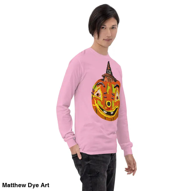 Pink long-sleeved Pumpkin Witch Men’s shirt featuring a whimsical pumpkin graphic