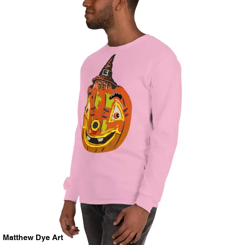Pink long-sleeved shirt featuring a whimsical pumpkin graphic for pumpkin witch men’s wear
