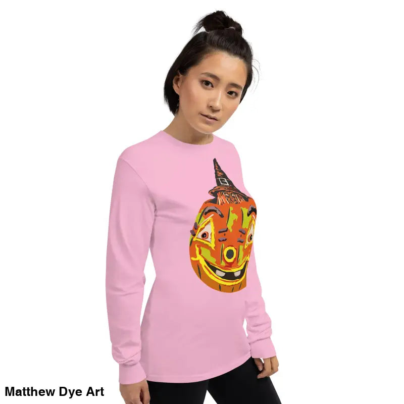 Pink long-sleeved shirt featuring a whimsical pumpkin graphic from the Pumpkin Witch Men’s collection