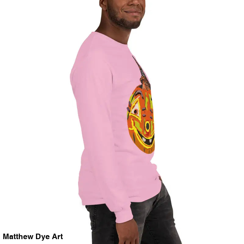 Pink long-sleeved shirt featuring a whimsical pumpkin graphic for the Pumpkin Witch Men’s collection