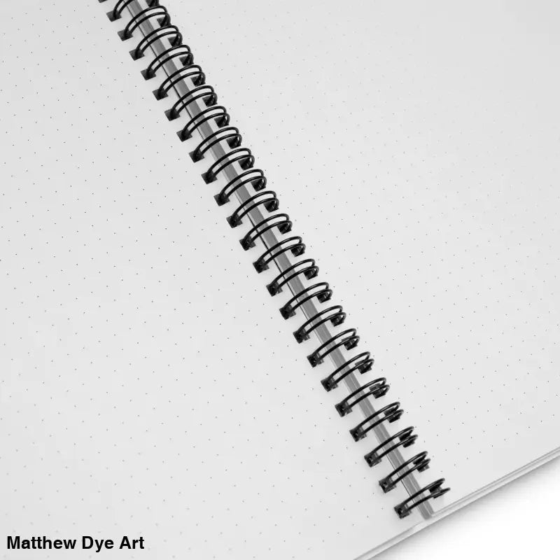 Spiral-bound dotted notebook featuring Matthew Dye art, the Pumpkin Witch Spiral design