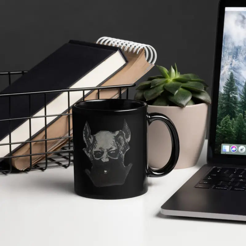 Elegant black glossy mug with skull design perfect for morning java or afternoon tea