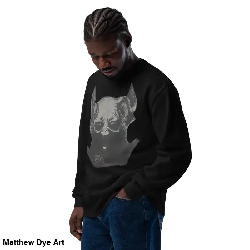 Black sweatshirt with a graphic print from the Sinister Embrace premium long sleeve collection