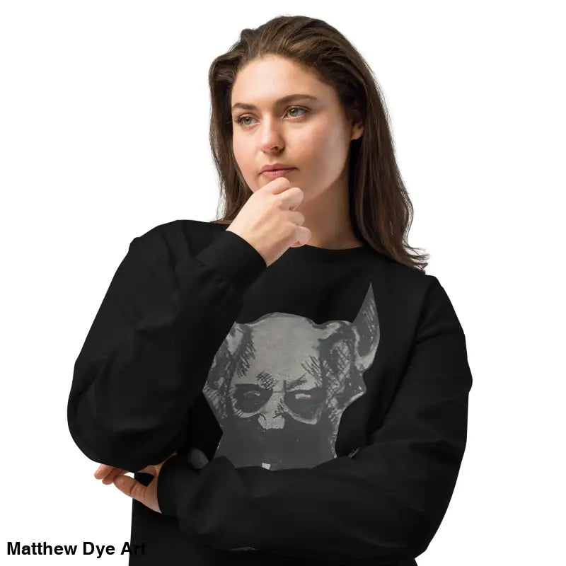 Black long-sleeved shirt with a sinister graphic, perfect for gothic fashion enthusiasts