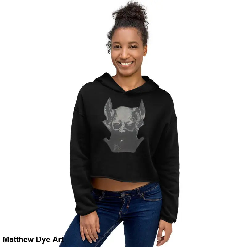 Black cropped hoodie featuring a sinister figure design with exaggerated pointed ears
