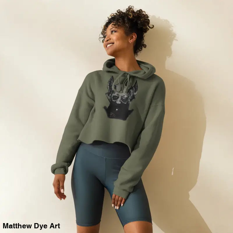 Woman in Sinister Entity Gothic Horror Crop Hoodie with exaggerated pointed ears design