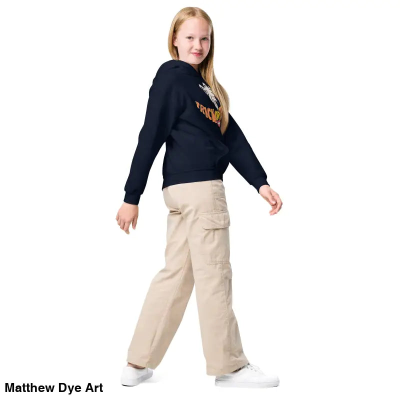 Girl in a dark blue sweatshirt from Spooktacular Smiles for child’s Halloween wardrobe