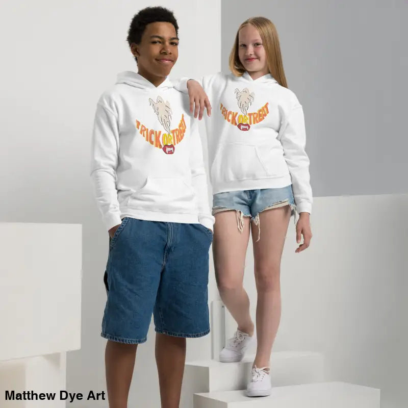 Two white heavy blend hoodies featuring Halloween graphics for child’s Halloween wardrobe