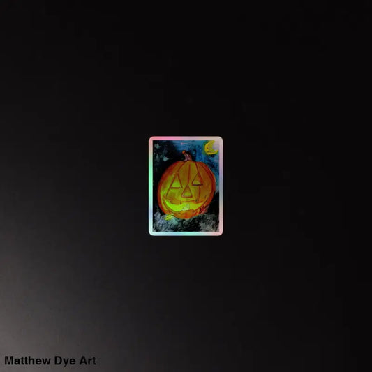 Holographic Jack-O’-Lantern Sticker featuring triangular face against dark night sky