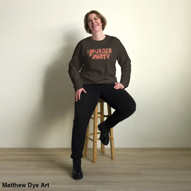 Woman wearing an eco-friendly Murder Party sweatshirt showcasing horror art design