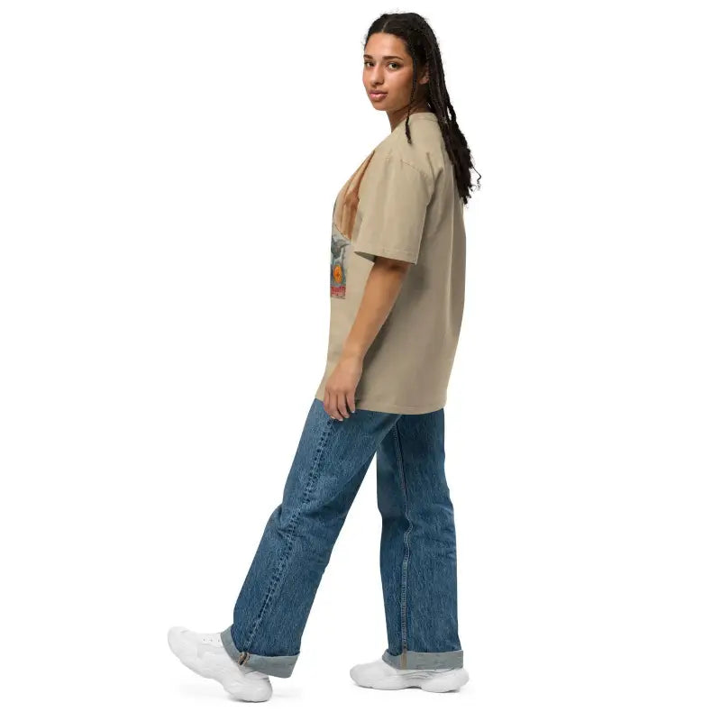 Person model wearing Phrenology Faded Oversized Tee with blue jeans and white sneakers