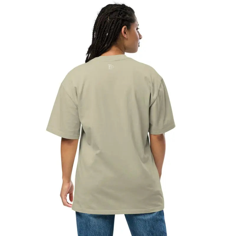 Beige faded oversized t-shirt styled with blue jeans from Stillness of Phrenology collection