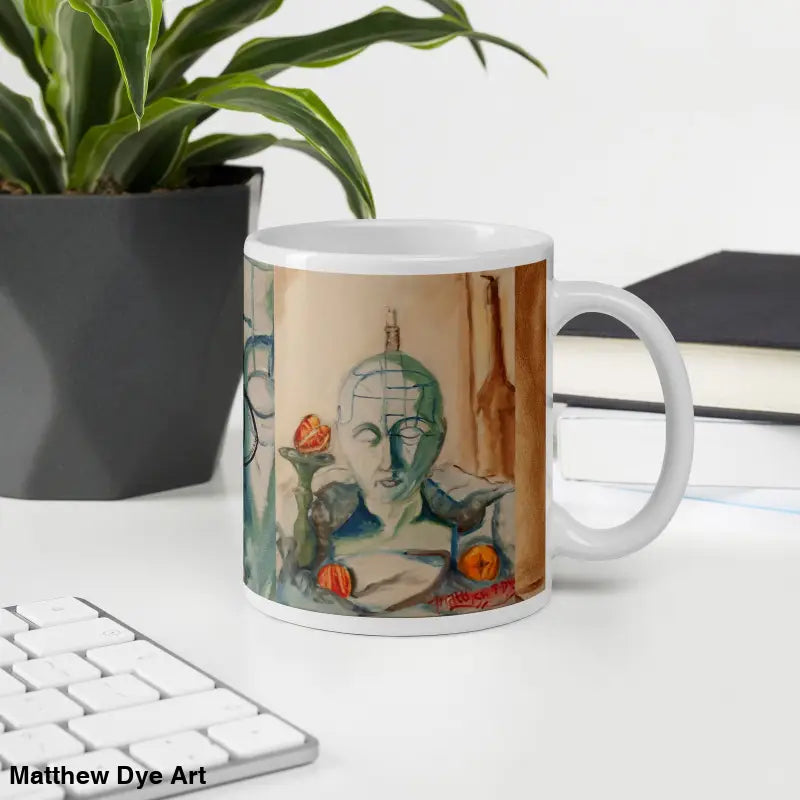 White ceramic mug featuring Matthew Dye art with faces and fruit in watercolor design