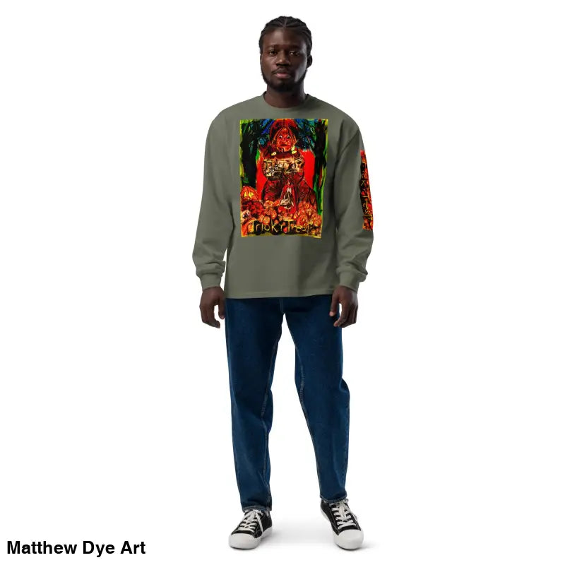Man in graphic long sleeve shirt and jeans, featuring a Trick R Treat Halloween design