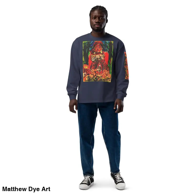 Man modeling a Trick r Treat unisex long sleeve shirt, perfect for Halloween festivities