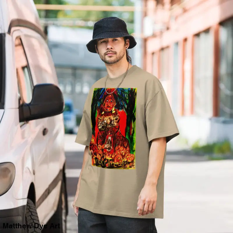 Oversized faded unisex Halloween tee featuring a haunting jack-o’-lantern design