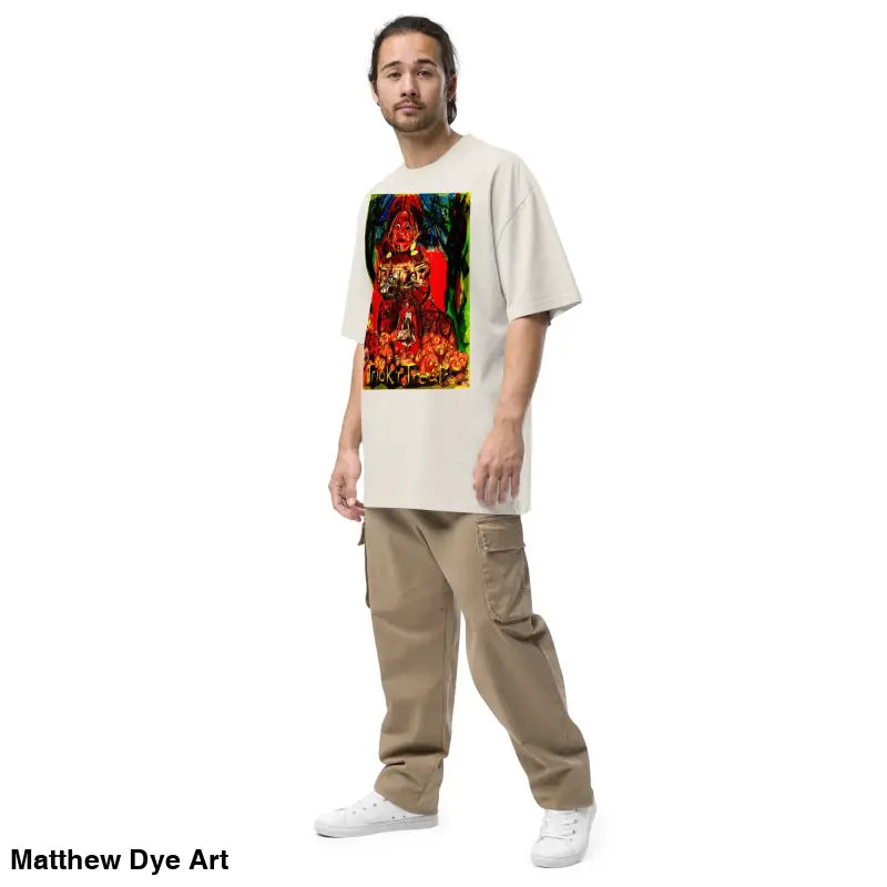 Man in graphic tee and cargo pants featuring a haunting jack-o’-lantern for Trick ’r Treat