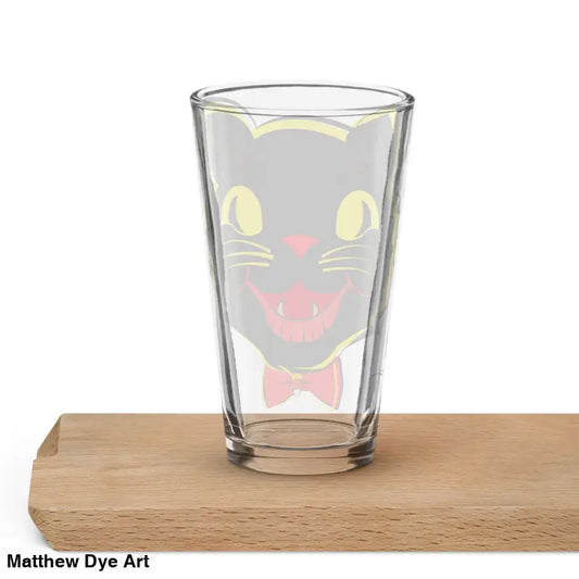 Vintage Cat Shaker Pint Glass featuring a black cat face design with yellow eyes