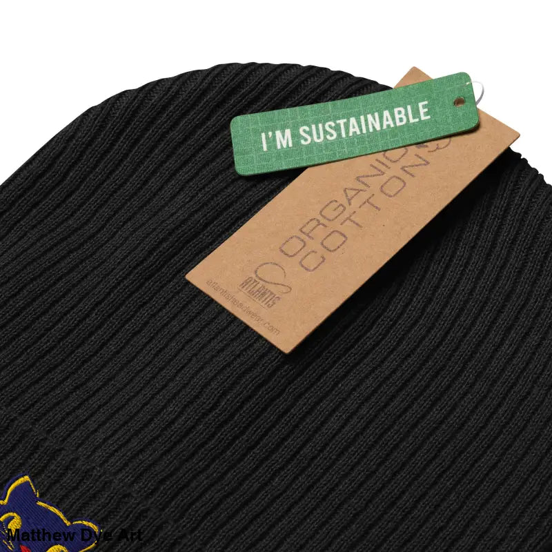 Black knit beanie with tags showcasing Vintage Black Cat design for Halloween