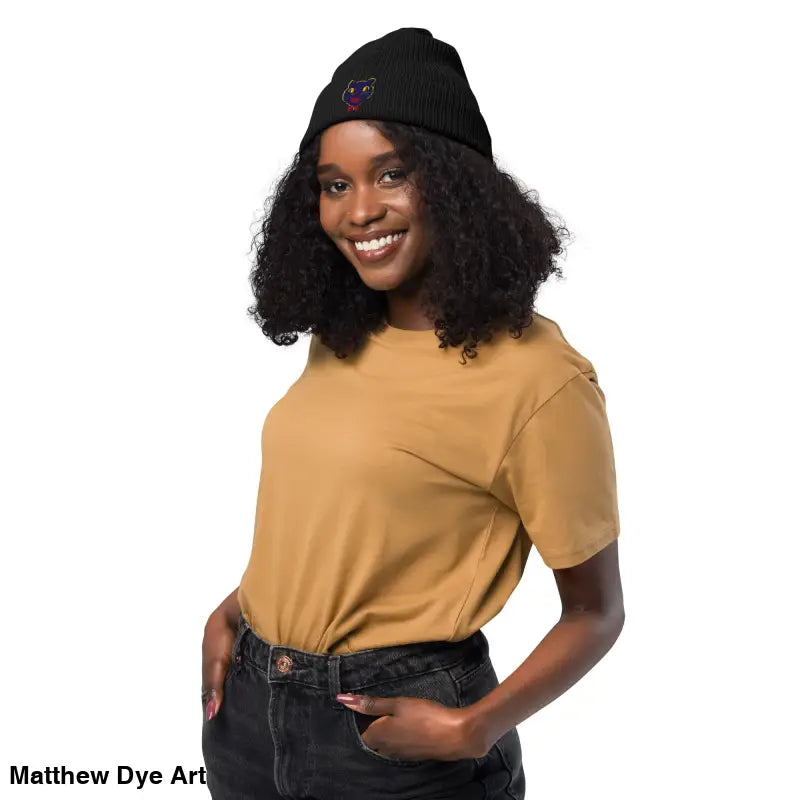 Black knit beanie featuring a vintage Halloween cat embroidered design for unisex wear