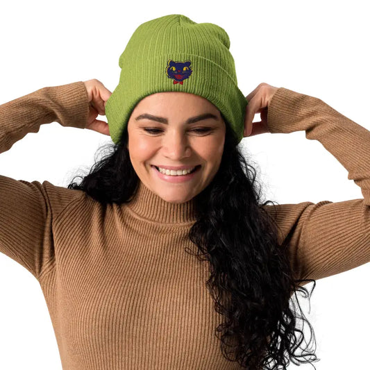 Green knit beanie featuring vintage Halloween cat design, perfect organic beanie choice