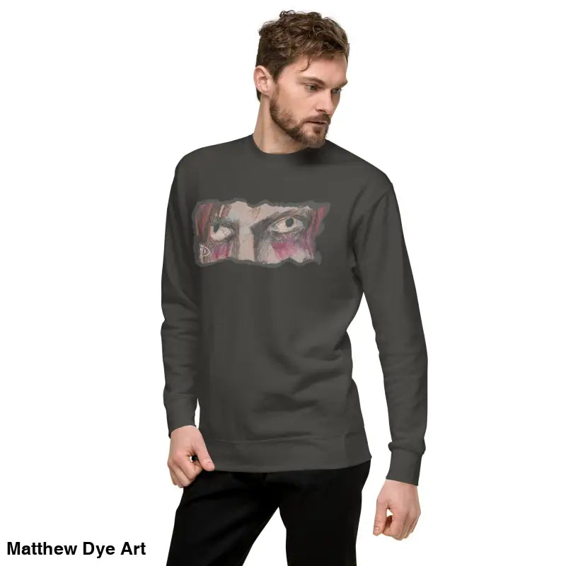 Gray long-sleeved Watcher’s Gaze Unisex Sweatshirt with eye graphic embodies urban elegance
