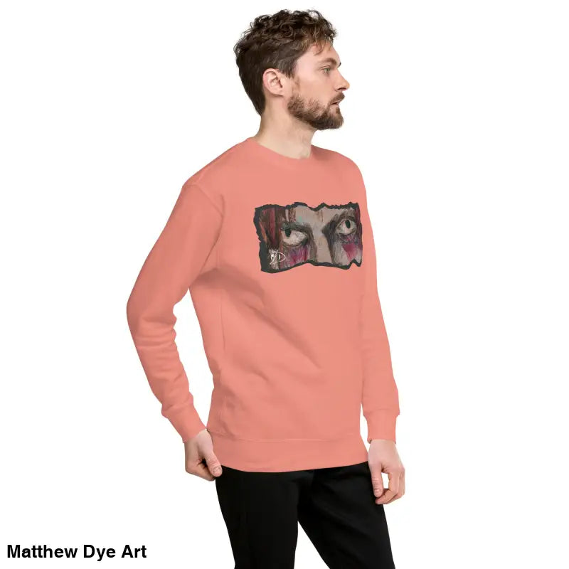 Salmon-colored sweatshirt with eye graphic, a timeless piece enriched with urban elegance
