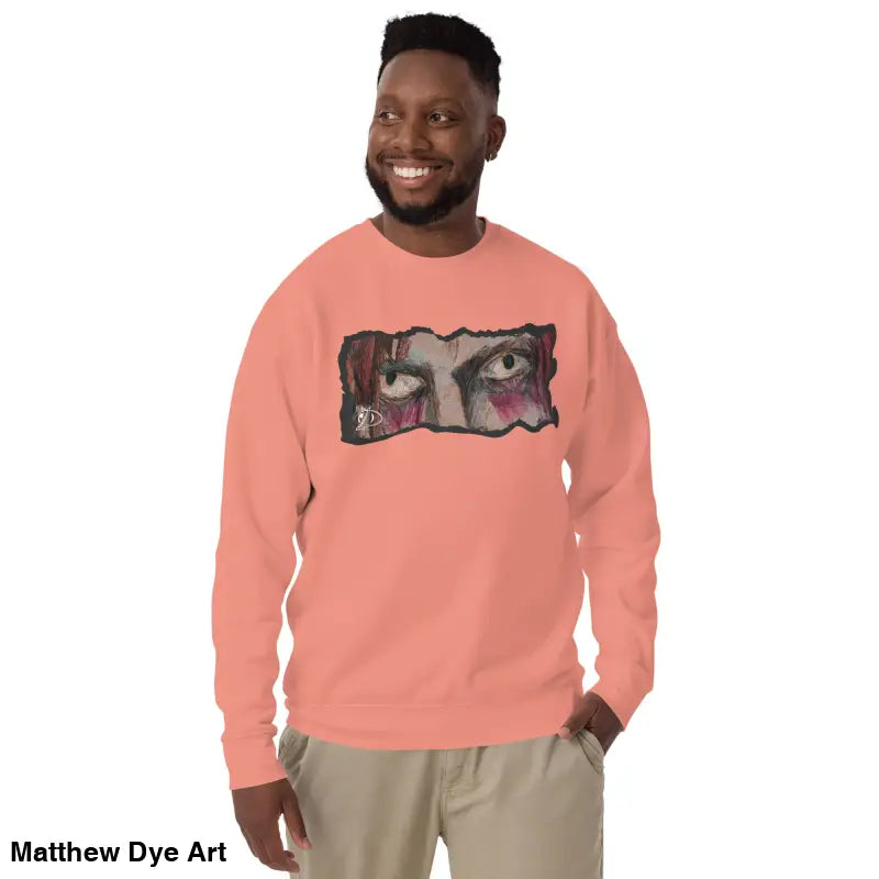Salmon-colored sweatshirt featuring eye graphic, a timeless piece enriched with urban elegance