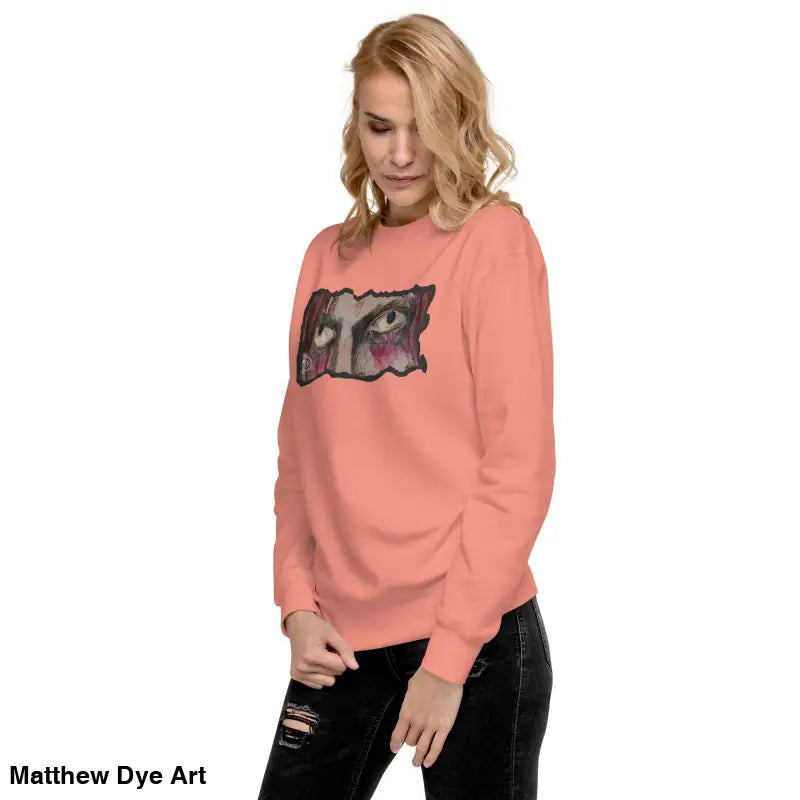 Salmon-colored sweatshirt with eye graphic in classic sweatshirt silhouette for urban elegance