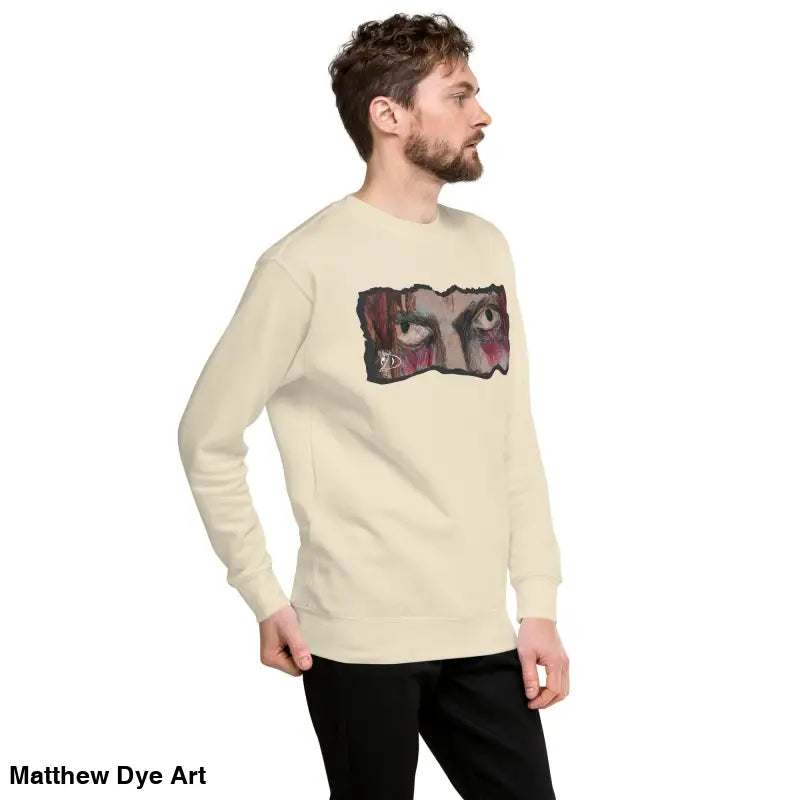 Beige sweatshirt with eye graphic, a timeless piece enriched in urban elegance