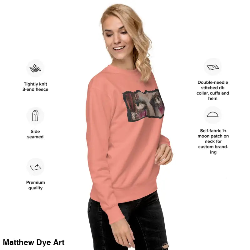 Salmon-colored sweatshirt with eye graphic, a timeless piece enriched with urban elegance