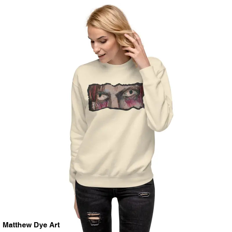 Beige Watcher’s Gaze Unisex Sweatshirt features eye graphic in classic sweatshirt silhouette