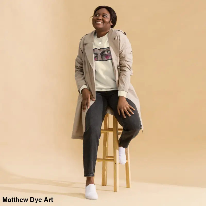Woman in casual outfit wearing Watcher’s Gaze Unisex Sweatshirt, a timeless piece enriched by urban elegance