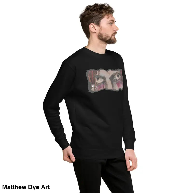Black long-sleeved shirt with eye graphic featuring urban elegance in a classic sweatshirt silhouette