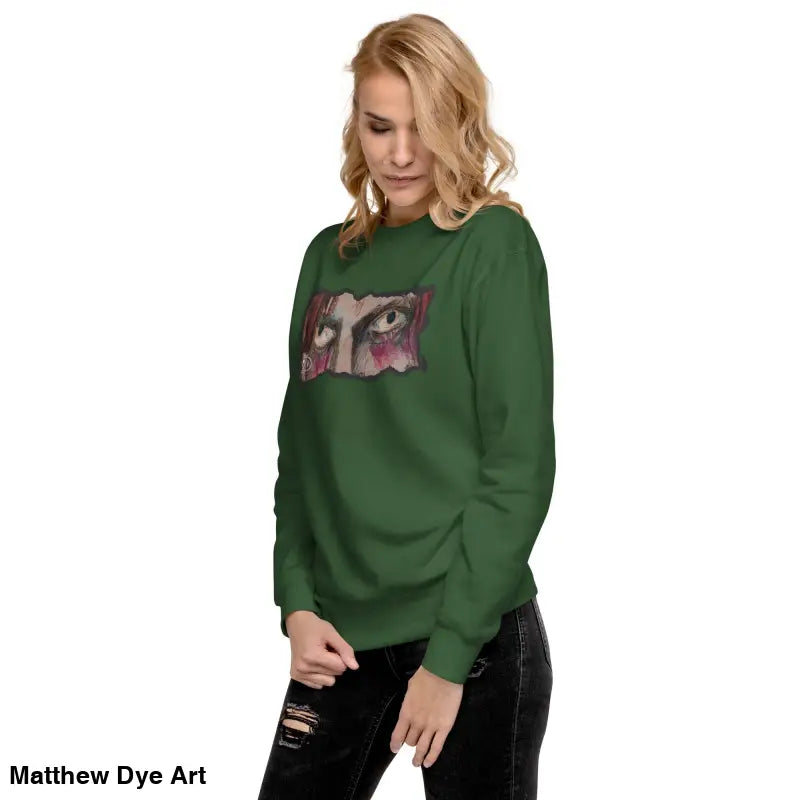 Green sweatshirt featuring an eye graphic, a timeless piece enriched with urban elegance