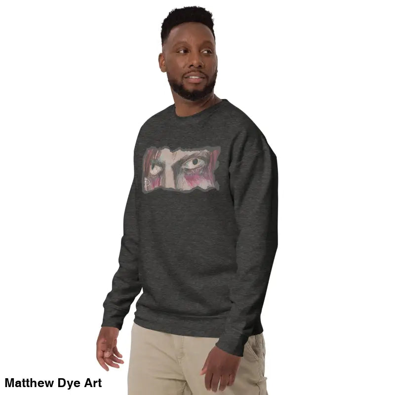 Man showcasing Watcher’s Gaze Unisex Sweatshirt featuring urban elegance and horror art
