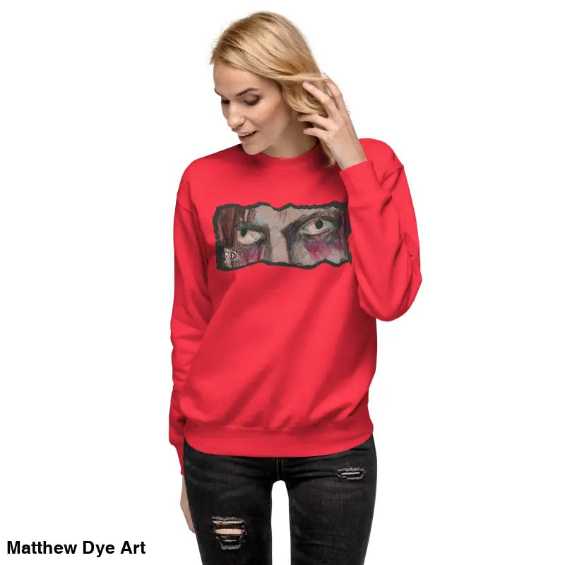 Red sweatshirt featuring eye graphic in classic sweatshirt silhouette for urban elegance
