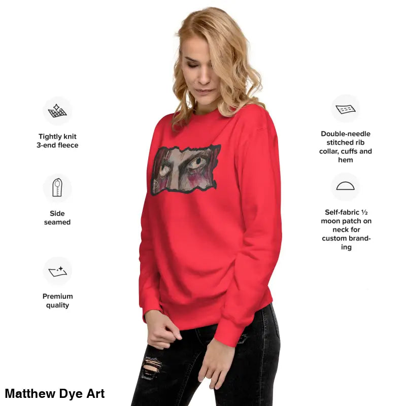 Red sweatshirt featuring an eye graphic, a timeless piece enriched with urban elegance