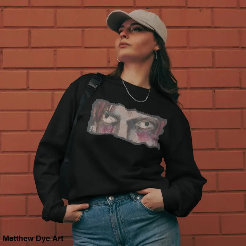 Woman in black sweatshirt with eye graphic wearing an elegant premium long sleeve shirt