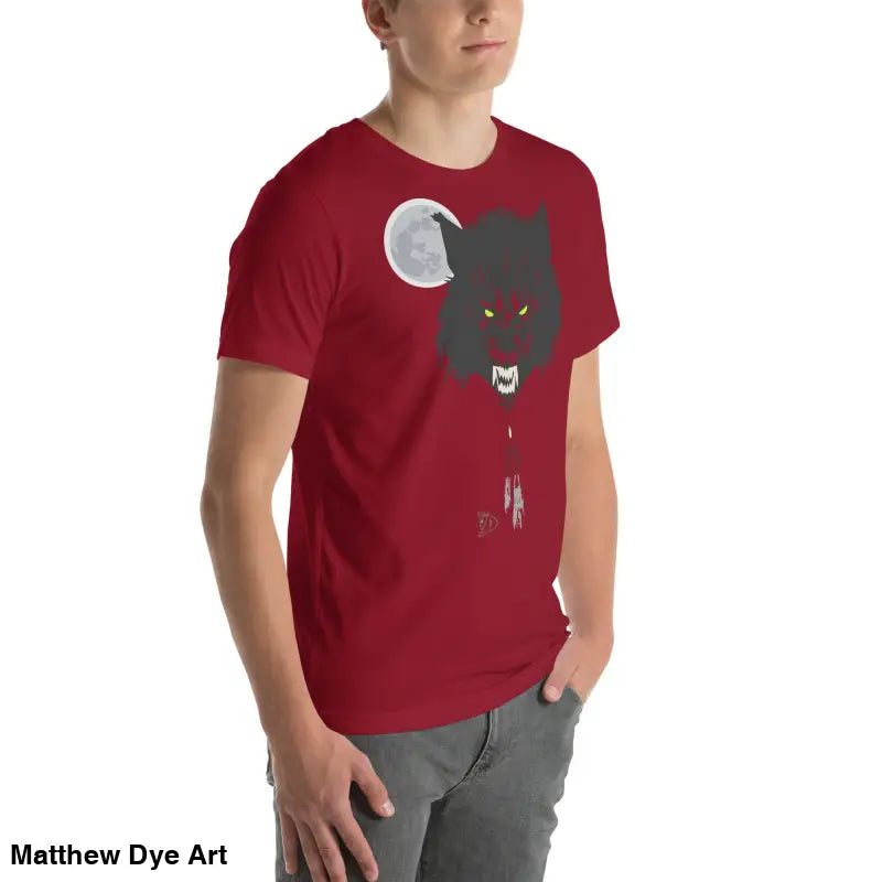 Red t-shirt embodies cherished dreams with dark wolf head design and glowing moon graphic