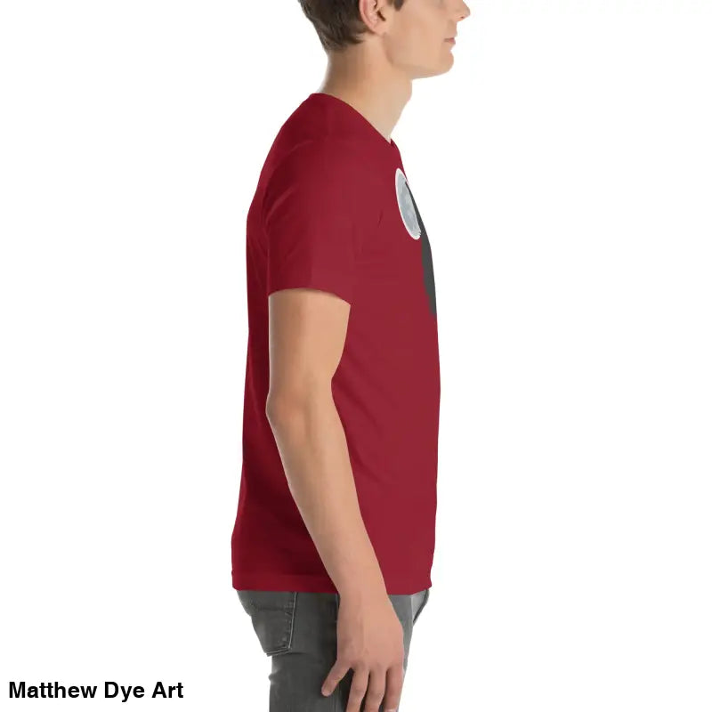 Red short-sleeved t-shirt embodies cherished dreams in a side view pose