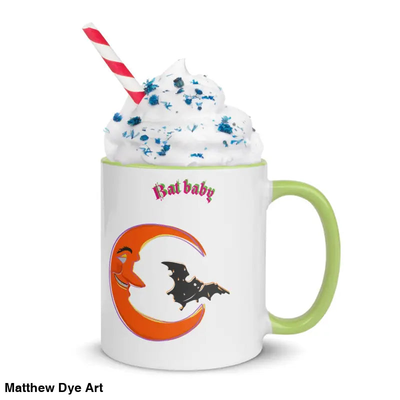 Halloween-themed bat baby mug adorned with whipped topping and a vibrant orange crescent